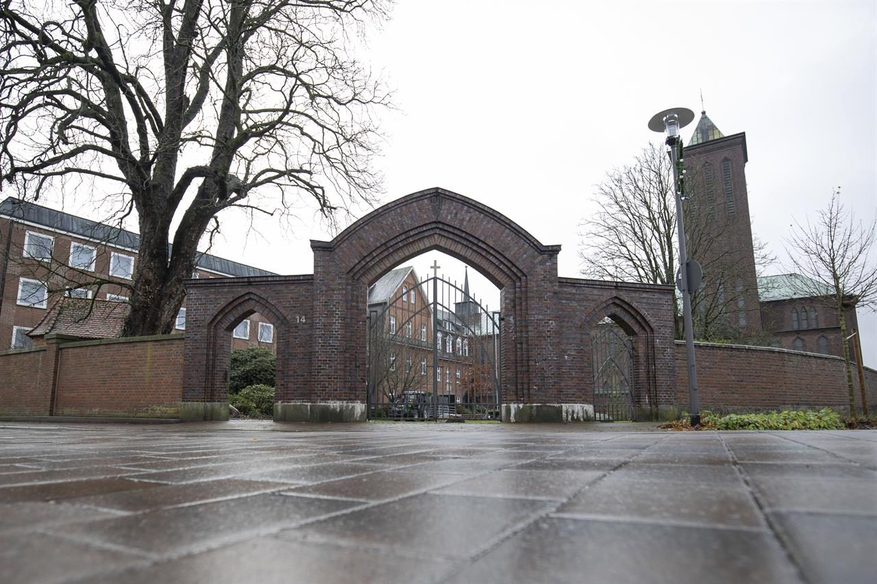 Exterior view of the monastery of the Franciscan Order in Thuine, Germany, Tuesday, Dec.1, 2020. Church authorities say 76 Catholic nuns have tested positive for COVID-19 after an outbreak of coronavirus at a Franciscan convent in northwestern Germany. Another 85 nuns received negative test results at the monastery in Thuine, not far from the Dutch border, the convent’s Mother Superior told The Associated Press on Tuesday. (Friso Gentsch/dpa via AP)