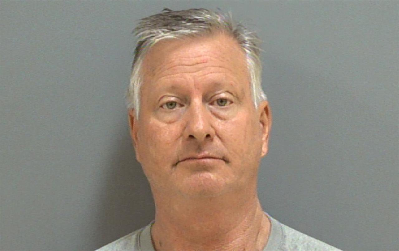 FILE - In this undated file photo provided by Darlington County jail is former Florence County Sheriff Kenney Boone. Boone who previously pleaded guilty to stealing public money and was then arrested a month later on a criminal domestic violence charge pleaded guilty Wednesday, Dec. 2, 2020, to the abuse count. A judge sentenced Boone to spend 30 days in jail or pay a $1,000 fine, suspended upon the successful completion of nearly seven months of domestic abuse counseling, South Carolina Attorney General Alan Wilson announced. (Darlington County Jail via AP)
