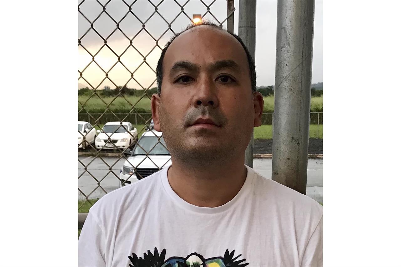 This photo provided by the Kauai Police Department shows Wesley Moribe in Lihue, Hawaii, on Nov. 29, 2020. Authorities say a couple was arrested at a Hawaii airport after traveling on a flight from the U.S. mainland despite knowing they were infected with COVID-19. The Kauai Police Department says Wesley Moribe and Courtney Peterson were arrested on suspicion of second-degree reckless endangering. (Kauai Police Department via AP)