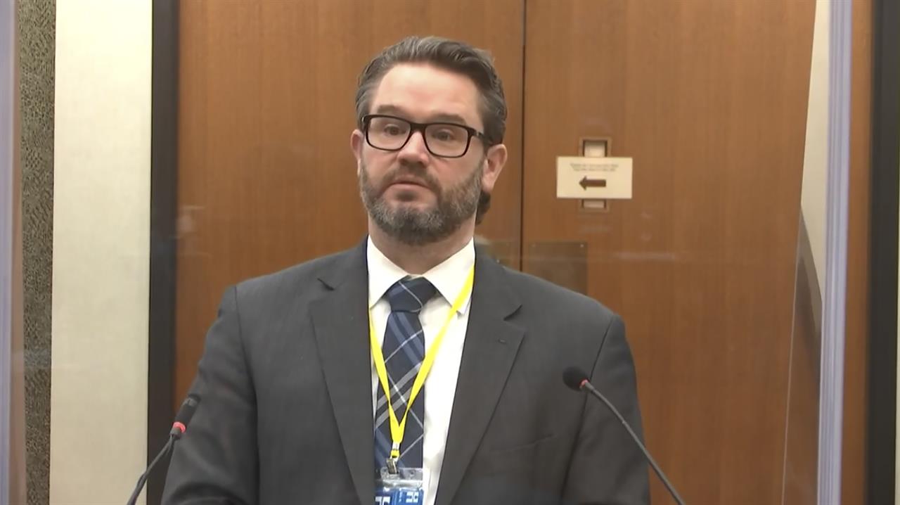 FILE-In this image from video, defense attorney Eric Nelson questions Dr. Lindsey Thomas, a forensic pathologist, now retired, as Hennepin County Judge Peter Cahill presides Friday, April 9, 2021, in the trial of former Minneapolis police Officer Derek Chauvin at the Hennepin County Courthouse in Minneapolis. Chauvin is charged in the May 25, 2020 death of George Floyd. Like any defense attorney, Eric Nelson has a broader strategy as he questions witnesses at Derek Chauvin’s trial in George Floyd’s death. (Court TV via AP, Pool, File)