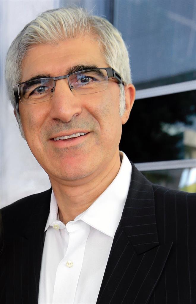 This photo provided by Najafi Companies shows Jahm Najafi. Investor Jahm Najafi has traditionally been a low-profile billionaire. But he's recently been popping up across headlines for his partnerships and philanthropy. It was announced in February that 58-year-old Najafi was joining former NFL star Colin Kaepernick to form Mission Advancement. (Najafi Companies via AP)