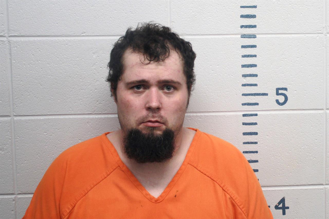 In a booking photo provided by the Howell County Sheriff, Christopher Lindley of Thayer, Missouri, is shown. A shooting during the weekend at a southern Missouri convenience store killed a truck driver from California and critically injured three other people, authorities said Monday, April 12, 2021. (Howell County Sheriff via AP)