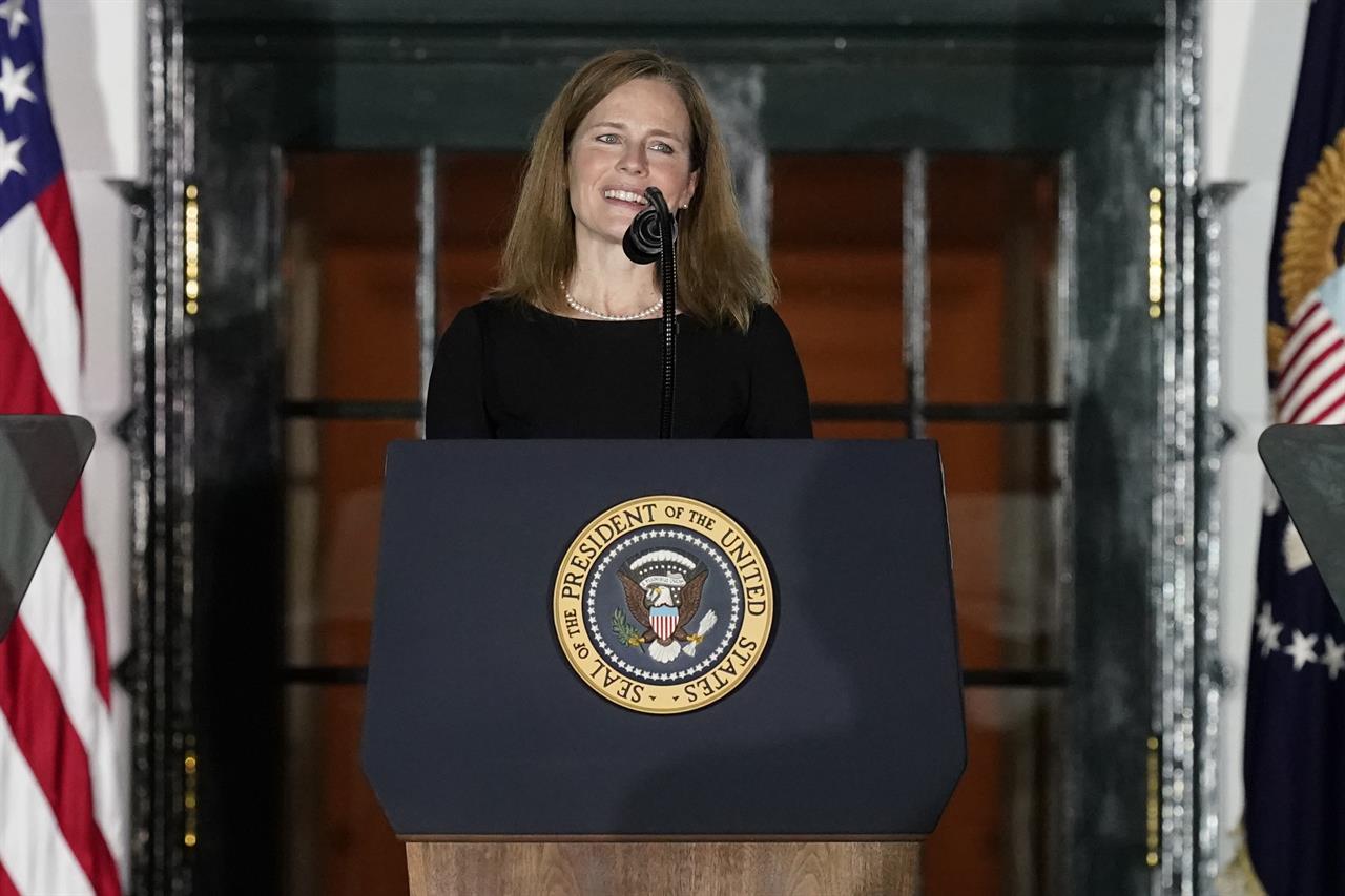 FILE - Amy Coney Barrett speaks on the South Lawn of the White House in Washington, Monday, Oct. 26, 2020. Barrett has a book deal with a Penguin Random House imprint, The Associated Press has learned. Adrian Zackheim, who runs the conservative Sentinel imprint, confirmed Monday, April 19, 2021 that he has an agreement with Barrett, who last fall was approved by the Republican-led Senate to joint the court just weeks after the death of Justice Ruth Bader Ginsburg. (AP Photo/Alex Brandon, file)