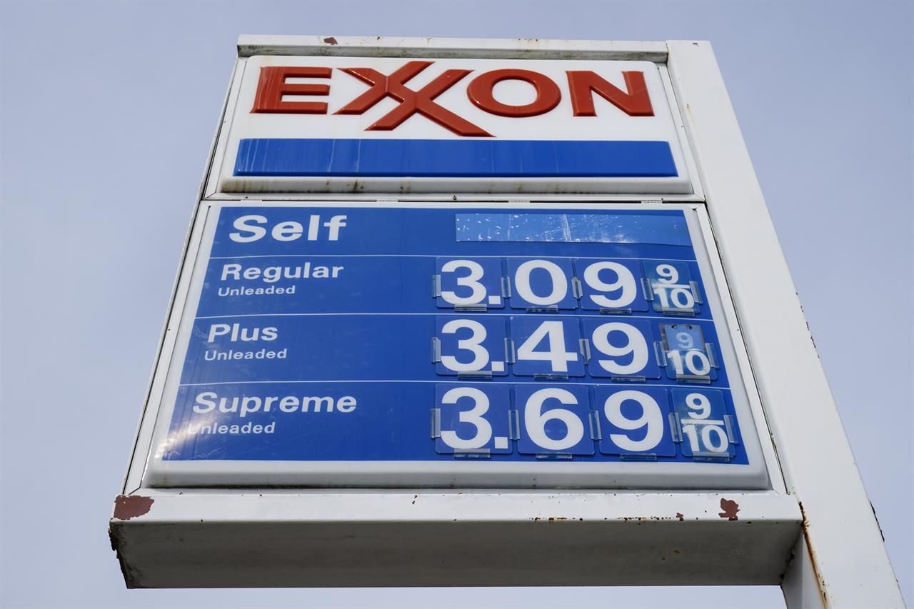 Shown is an Exxon service station sign in Philadelphia, Wednesday, April 28, 2021. Exxon Mobil reported profits of $2.73 billion in the first quarter, after a tumultuous year led to major spending reductions. The The Irving, Texas company produced 3.8 million barrels of oil per day in the first quarter, up 3% from the fourth quarter of 2020. (AP Photo/Matt Rourke)