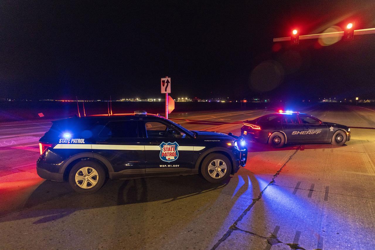 Law enforcement blocks the road in front of the Oneida Bingo and Casino in Green Bay, Wis on Saturday May 1, 2021 after reports of an active shooter. A spokesperson for a Wisconsin casino says an undetermined number of people have been shot at the casino. The Oneida Casino in Green Bay tweeted Saturday there was an active shooter at the casino. (AP Photo/Mike Roemer)