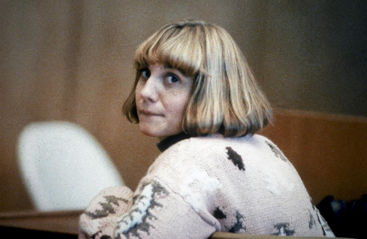 FILE - This Jan. 22, 1991 file photo shows ex-school teacher Carolyn Warmus during trial in Westchester County Court, in White Plains, N.Y. Warmus, convicted to serve a sentence of 25 years to life for the 1989 murder of her lover's wife, is to be released from prison. Prosecutors in New York have consented to DNA testing of evidence from the 1992 trial of so-called "Fatal Attraction" killer Warmus, who was paroled two years ago after serving 27 years in prison. (John Pedin/The Daily News via AP, File)