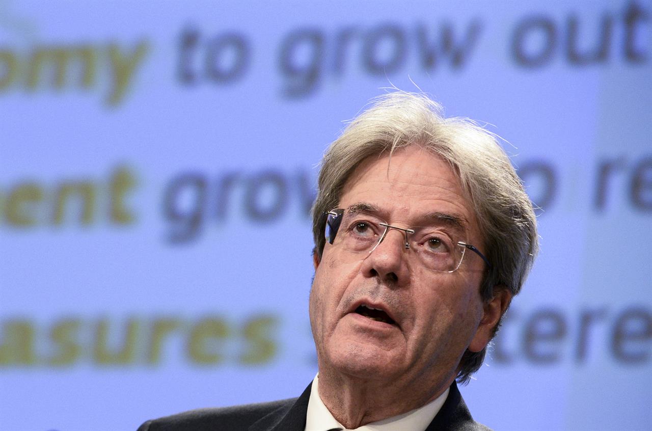 European Commissioner for Economy Paolo Gentiloni speaks during a media conference on the economic forecast for spring 2021 at EU headquarters in Brussels, Wednesday, May 12, 2021. The European Union economy is set to bounce back strongly this year after the deep coronavirus recession and member states are forecast to have recouped the ground lost by the end of next year. (Johanna Geron, Pool via AP)