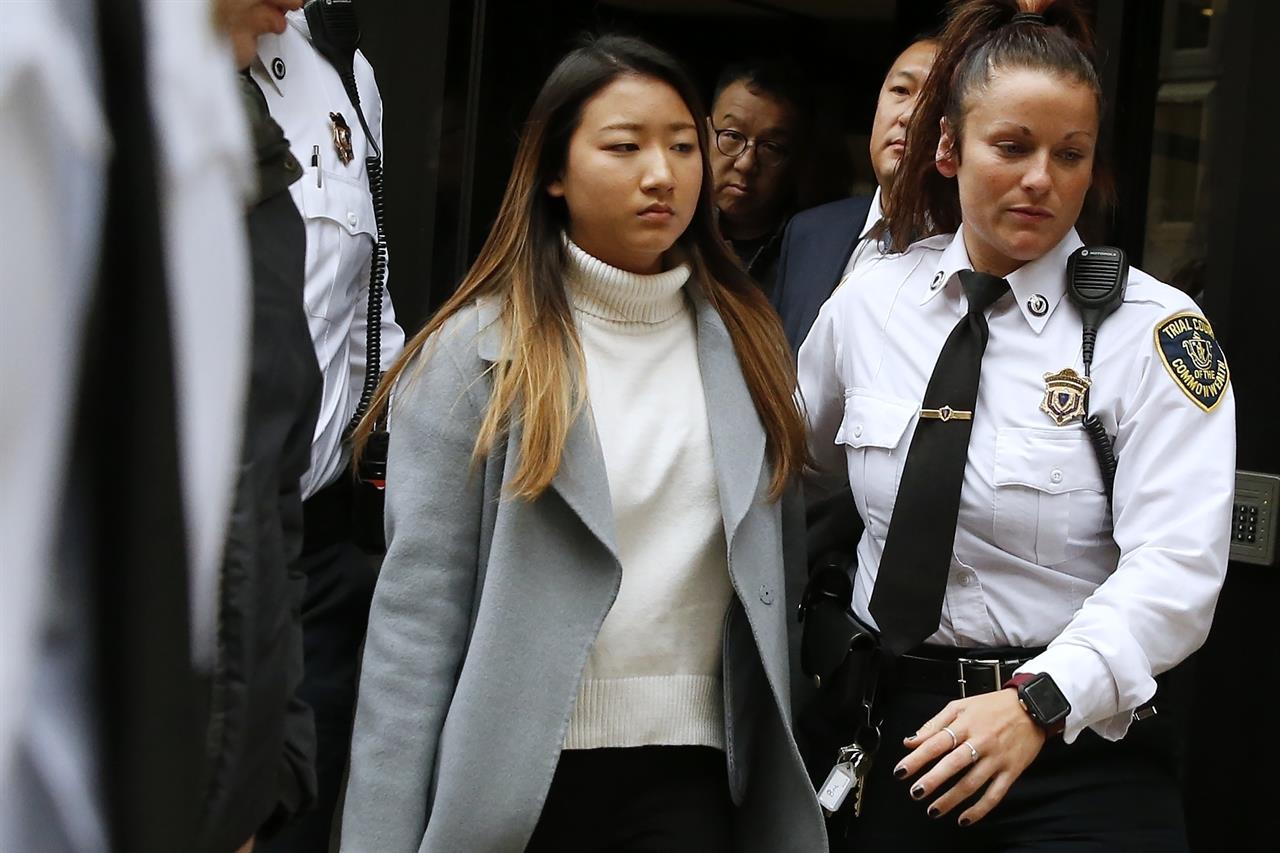 FILE - In this Nov. 22, 2019, file photo, Inyoung You leaves Suffolk Superior Court in Boston after pleading not guilty to involuntary manslaughter of Alexander Urtula, who took his own life on the day of his Boston College graduation in May. The manslaughter case against the former Boston College student accused of encouraging her boyfriend, Alexander Urtula, to take his own life will head toward trial, prosecutors said Friday, Jan. 15, 2021. (AP Photo/Michael Dwyer, File)