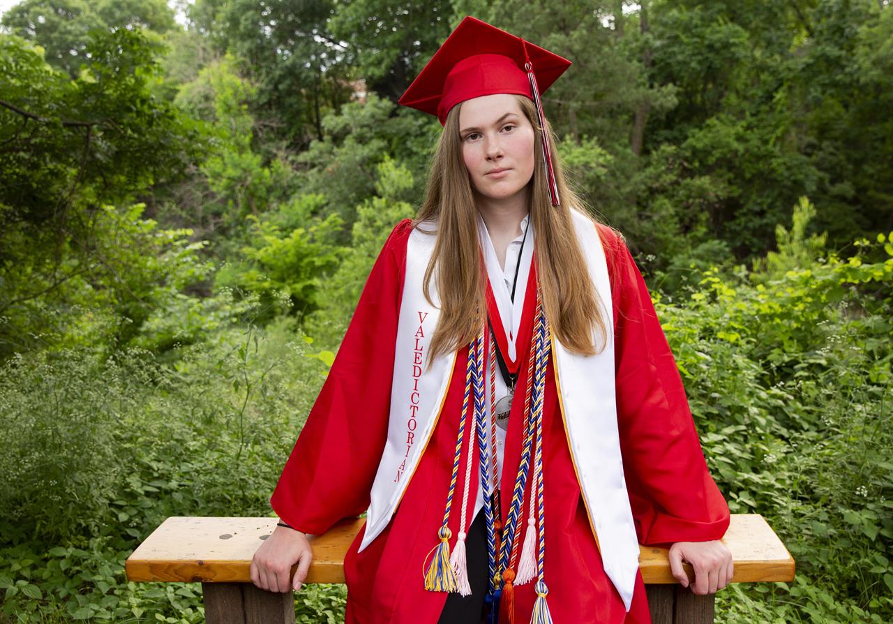 Paxton Smith, Lake Highlands High School valedictorian, poses for a photo, Wednesday, June 2, 2021, in Dallas. Smith scrapped a speech approved by her school administrators and delivered an abortion rights call in its place. (Juan Figueroa/The Dallas Morning News via AP)