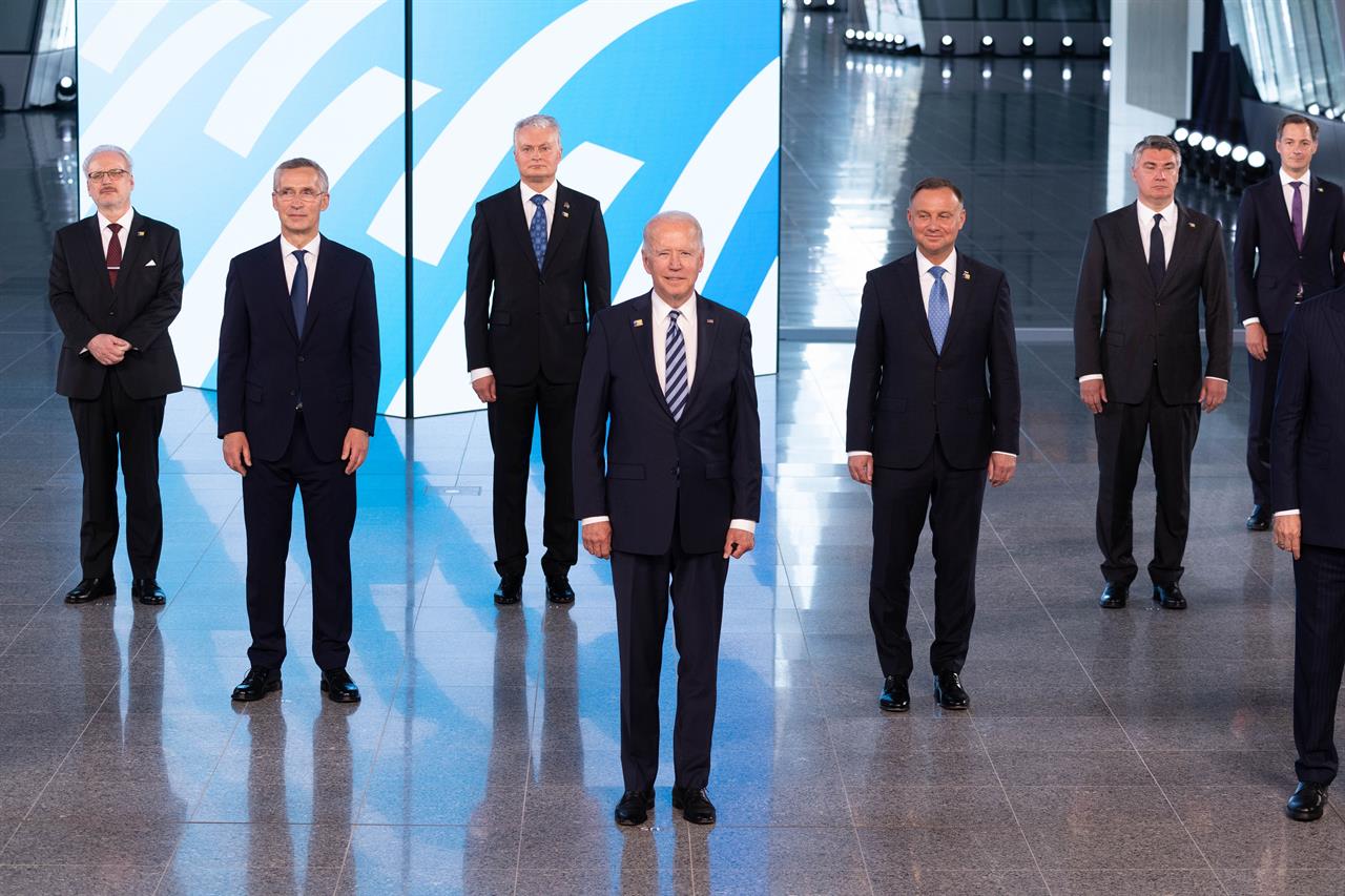 NATO Secretary General Jens Stoltenberg, second left, and U.S President Joe Biden, center, pose with other leaders during a family picture at the NATO headquarters where the 30-nation alliance hopes to reaffirm its unity and discuss increasingly tense relations with China and Russia, as the organization pulls its troops out after 18 years in Afghanistan, Monday June, 14, 2021. (Jacques Witt, Pool via AP)