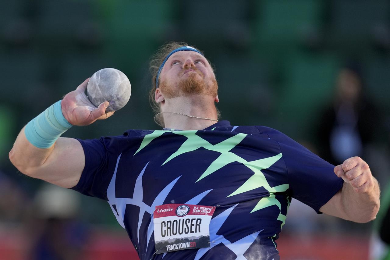 Ryan Crouser competes during the finals of men's shot put at the U.S. Olympic Track and Field Trials Friday, June 18, 2021, in Eugene, Ore. (AP Photo/Charlie Riedel)