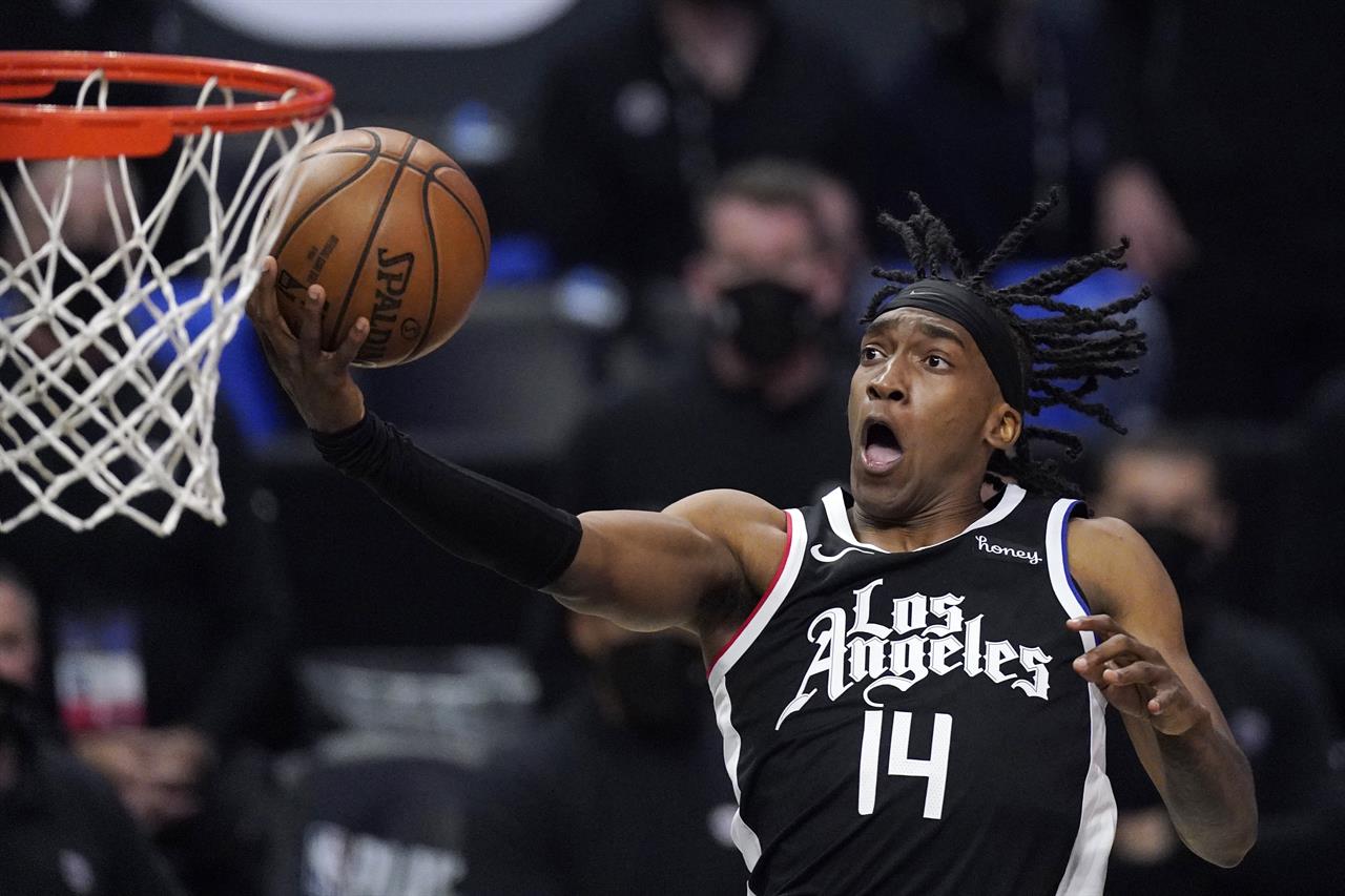 Los Angeles Clippers guard Terance Mann shoots during the second half in Game 6 of a second-round NBA basketball playoff series against the Utah Jazz Friday, June 18, 2021, in Los Angeles. (AP Photo/Mark J. Terrill)