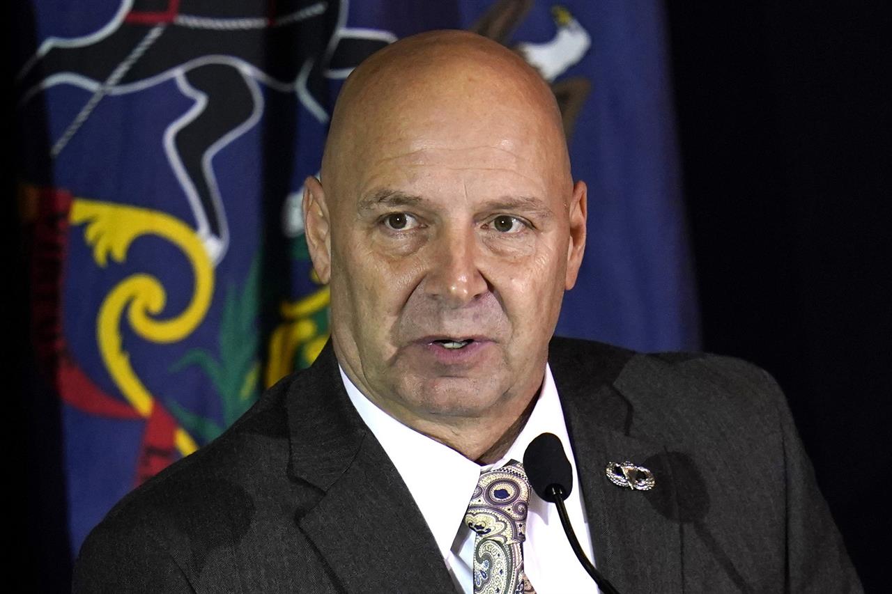 FILE - In this Nov. 25, 2020, file photo, state Sen. Doug Mastriano, R-Franklin, attends a hearing of the Pennsylvania State Senate Majority Policy Committee in Gettysburg, Pa. Former President Donald Trump's false claims of a stolen election have been debunked by the courts, his own Justice Department and scores of recounts. Mastriano, bolstered by support from top Republican candidates, has launched a push for a “forensic investigation” of the presidential election results, a review modeled on the widely-discredited process underway in Arizona. (AP Photo/Julio Cortez, File)