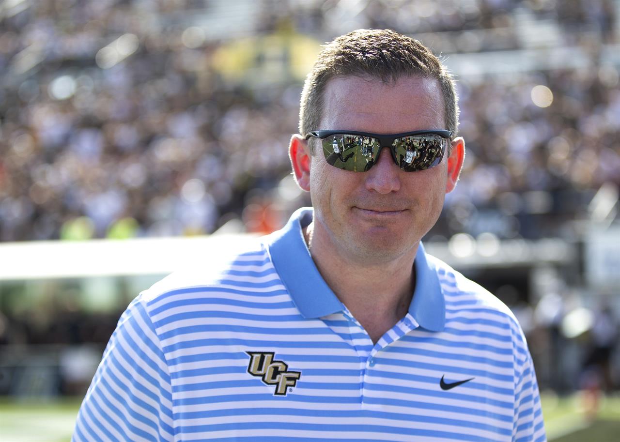 FILE - In this Nov. 2, 2019, file photo, Central Florida athletic director Danny White stands on the sideline at the team's NCAA college football game against Houston in Orlando, Fla. Tennessee has hired UCF athletic director Danny White as the Volunteers' new athletic director Thursday, Jan. 21, 2021, just three days after announcing the firing of football coach Jeremy Pruitt and athletic director Phillip Fulmer's retirement. (AP Photo/Willie J. Allen Jr., File)
