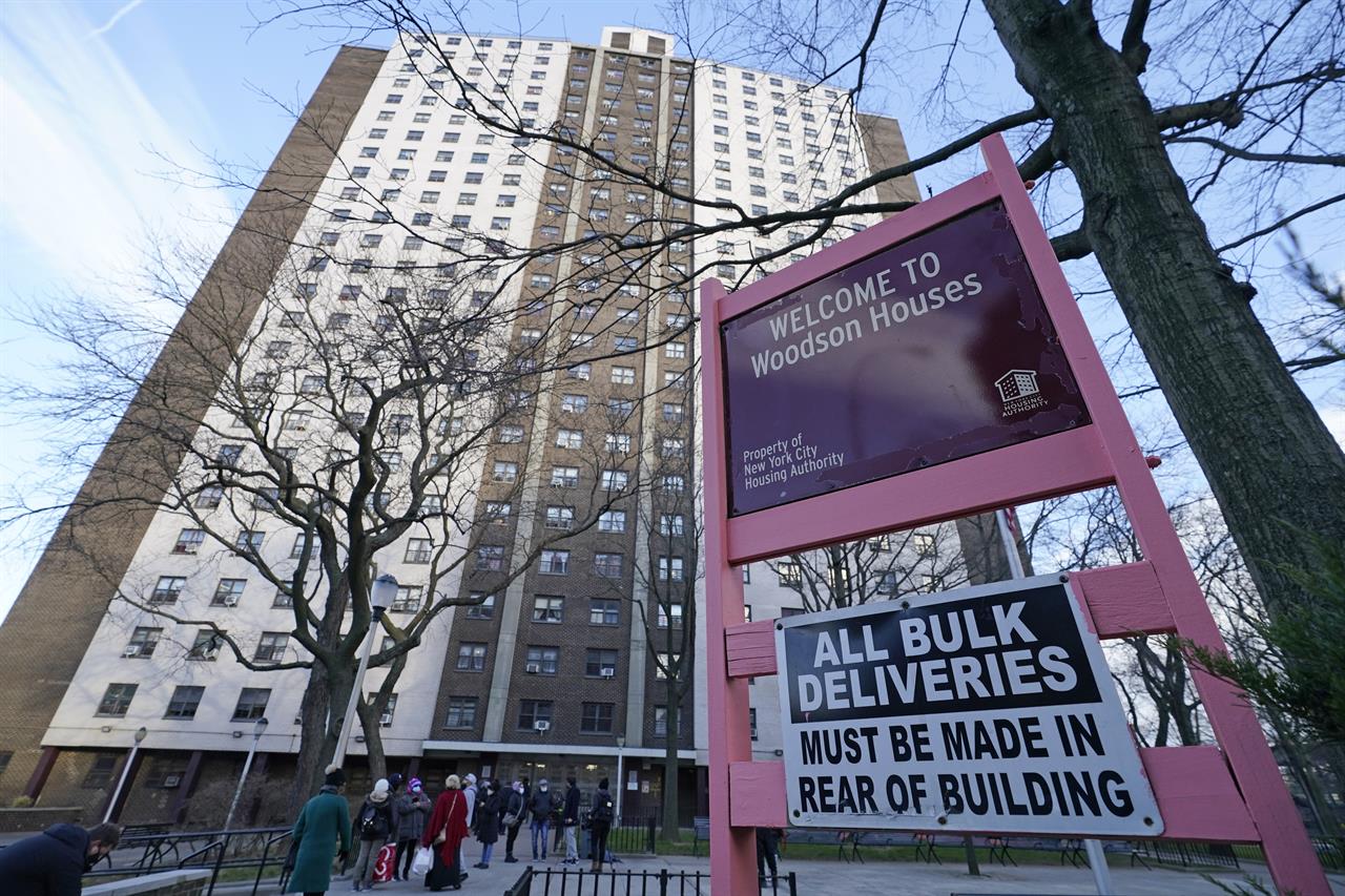 Woodson Houses, a New York City housing project for seniors and the site of three murders of three women according to authorities is shown, Thursday, Jan. 21, 2021, in the Brooklyn borough of New York. n. A 78-year-old victim was found dead last week with a telephone cord around her neck in her apartment at the housing project. The building was the scene of two other killings of elderly women in 2015 and in 2019 that had sparked complaints about security. Thursday, authorities announced the arrest of a suspect, Kevin Gavin, in the unsolved slayings of the women. Gavin lived in the building and was known to run errands for residents. He was arrested after forensic evidence and witnesses linked him to the murders, the officials said. (AP Photo/Kathy Willens)