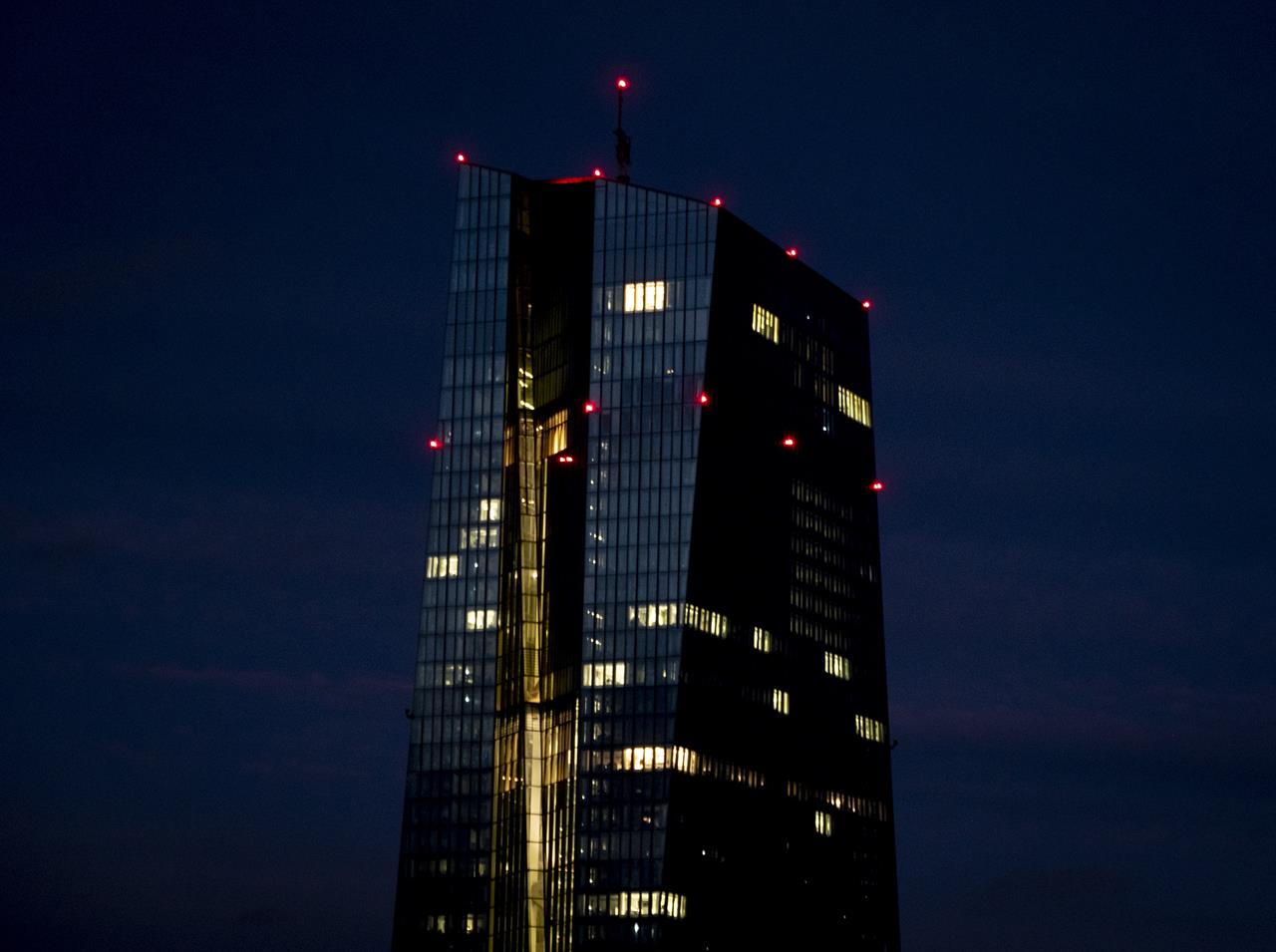 Office lights of the European Central Bank in Frankfurt, Germany, Wednesday, Jan. 13, 2021. (AP Photo/Michael Probst)