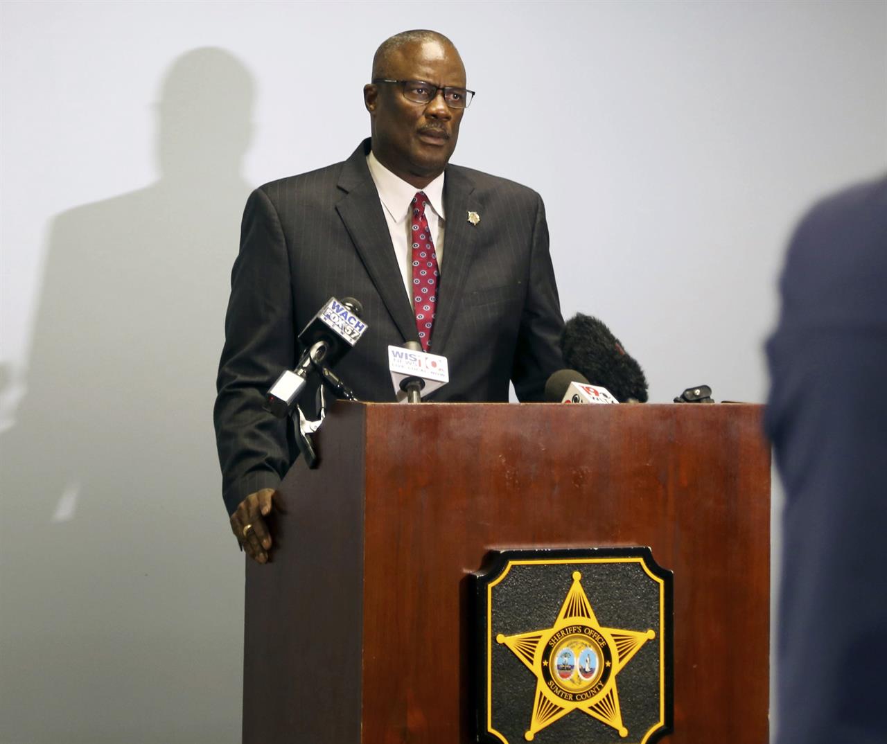 Sumter County Sheriff Anthony Dennis releases the names of two people found shot to death near Interstate 95 more than 44 years ago at a news conference on Thursday, Jan. 21, 2021, in Sumter, S.C. DNA testing helped identify the victims, whose killer has not been found. (Kayla Green/The Item via AP)
