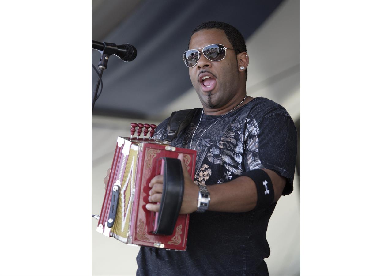 FILE - In this Sunday, May 4, 2008, file photo, Chris Ardoin, of Chris Ardoin & NuStep, performs during the 2008 New Orleans Jazz & Heritage Festival at the New Orleans Fairgrounds Racetrack in New Orleans. Ardoin was performing as the headliner at Zydeco Bike Fest, Friday, July 30, 2021, when he was shot, his wife, Kerri, posted on his official Facebook page. (AP Photo/Dave Martin, File)