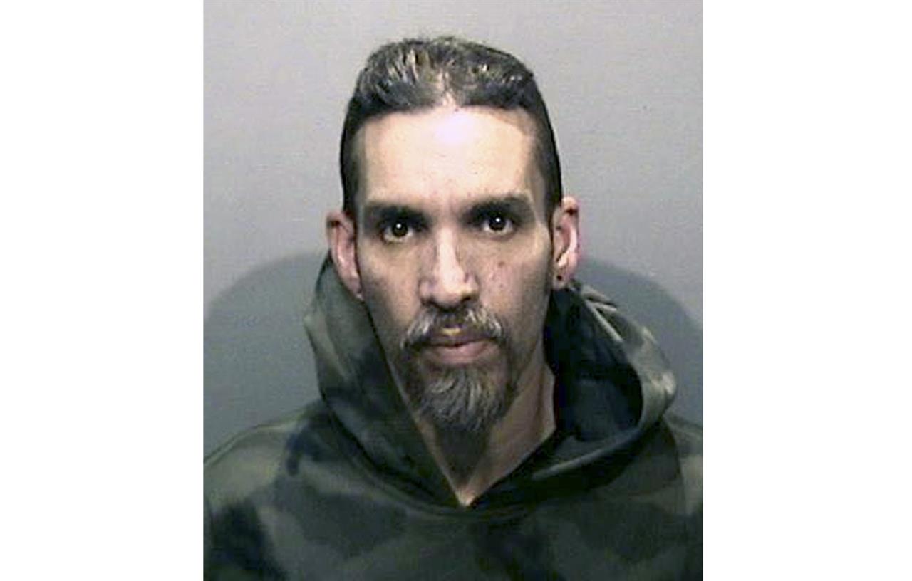 FILE - This June 5, 2017, file photo released by the Alameda County Sheriff's Office shows Derick Almena at Santa Rita Jail in Alameda County, Calif. Almena, who is facing a second trial after a 2016 fire killed 36 partygoers at a San Francisco Bay Area warehouse he's accused of illegally converting into a cluttered artists enclave, is expected to plead guilty later this month, relatives of several of the victims said. Almena, 50, is expected to plead guilty to 36 counts of involuntary manslaughter on Jan. 22, 2021. (Alameda County Sheriff's Office via AP, File)