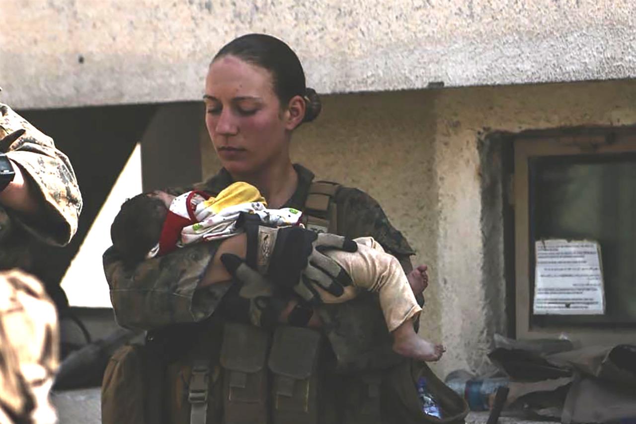 Slain Marine who cradled baby at Kabul airport loved her job - Vimarsana News