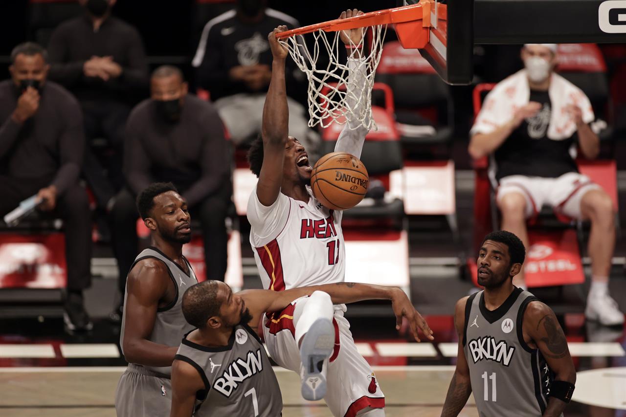 Harden, Durant help Nets break away late, beat Heat 9885