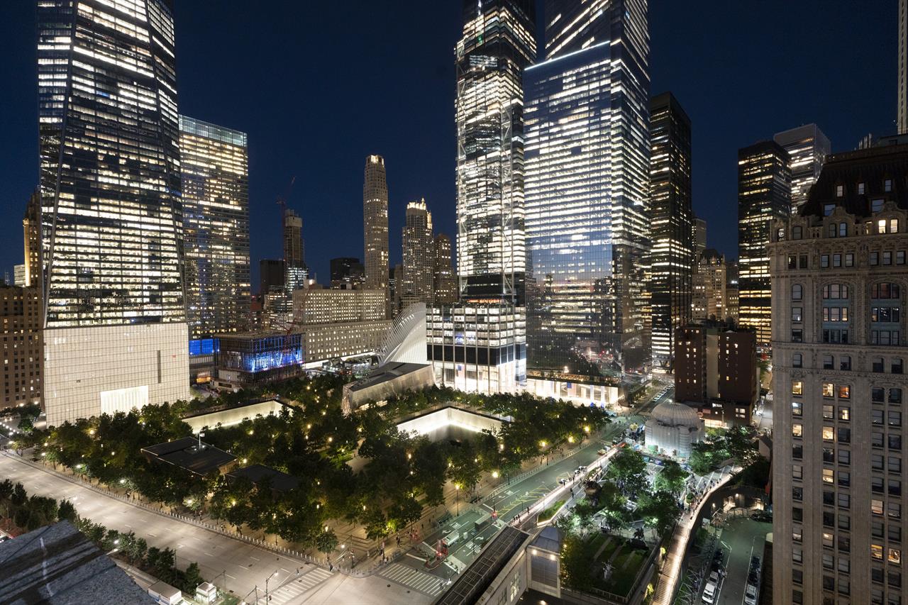 The World Trade Center is shown on the evening of Friday, Sept. 10, 2021, in New York. Saturday marks the 20th anniversary of the attacks of Sept. 11, 2001. (AP Photo/Mark Lennihan)