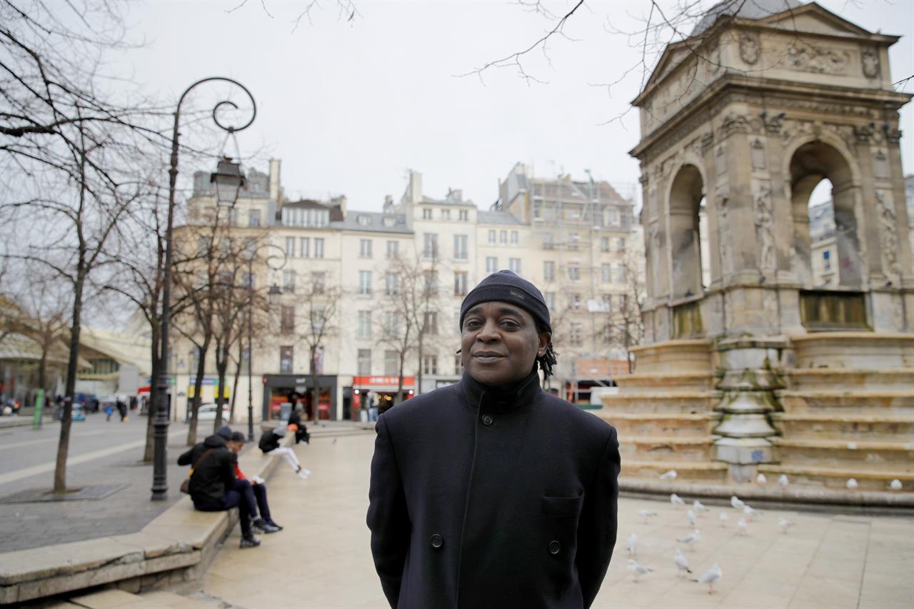 Omer Mas Capitolin poses in Paris, Tuesday Jan.26, 2021. In a first for France, six nongovernmental organizations launched a class-action lawsuit Wednesday against the French government for alleged systemic discrimination by police officers carrying out identity checks. Omer Mas Capitolin, the head of Community House for Supportive Development, a grassroots NGO taking part in the legal action, called it a "mechanical reflex" for French police to stop non-whites, a practice he said is damaging to the person being checked and ultimately to relations between officers and the members of the public they are expected to protect. (AP Photo/Christophe Ena)