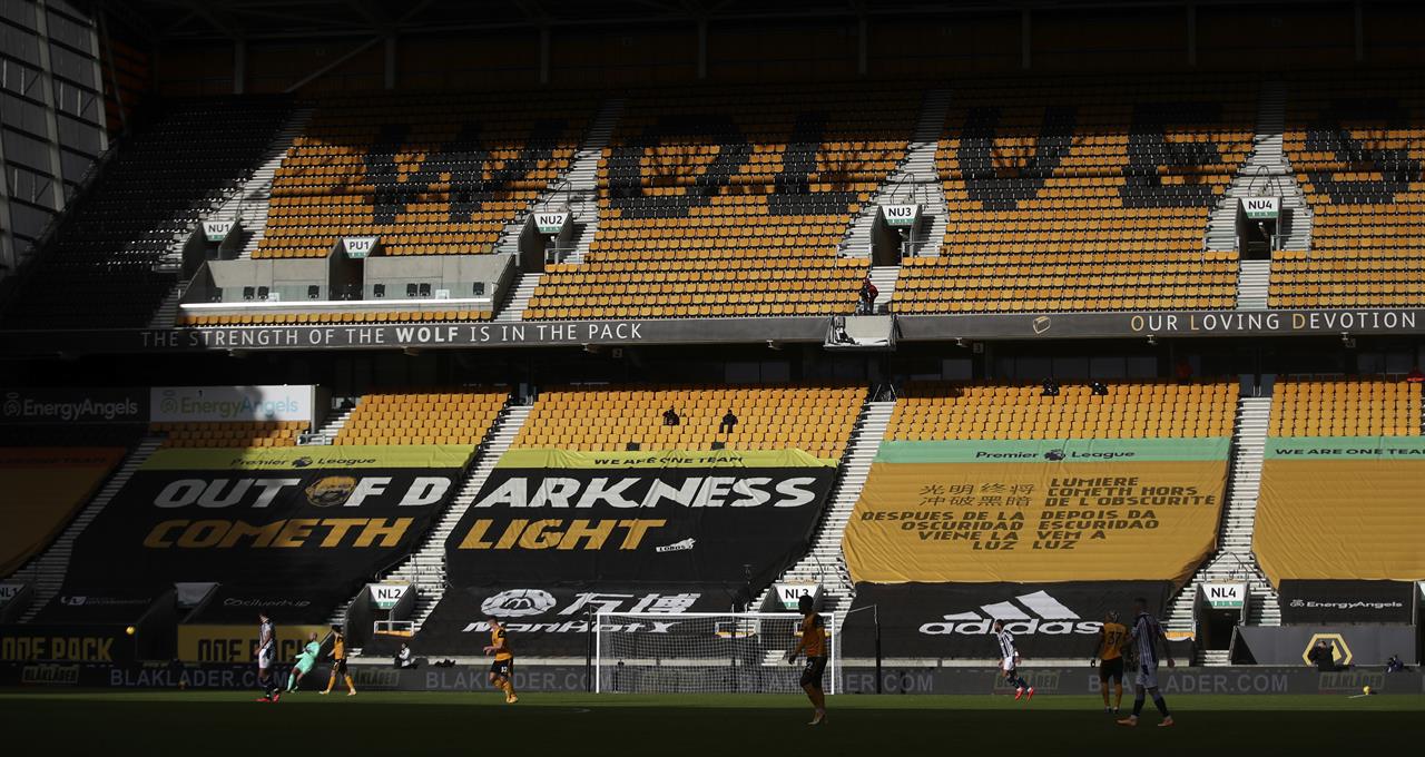 View of the empty stands during the English Premier League soccer match between Wolverhampton Wanderers and West Bromwich Albion at the Molineux Stadium in Wolverhampton, England, Saturday, Jan. 16, 2021. (Carl Recine/Pool via AP)