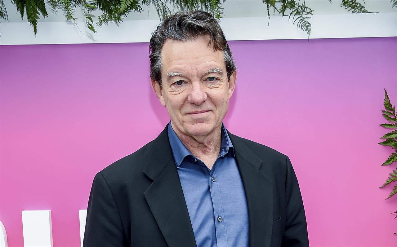 FILE - Lawrence Wright attends the Hulu 2017 Upfront Presentation on May 3, 2017, in New York. One of the first book-length inside accounts of the worldwide spread of COVID-19 will be coming out in June. Wright's "The Plague Year," which builds on a New Yorker story that ran earlier this month, will be published June 8. (Photo by Evan Agostini/Invision/AP, File)
