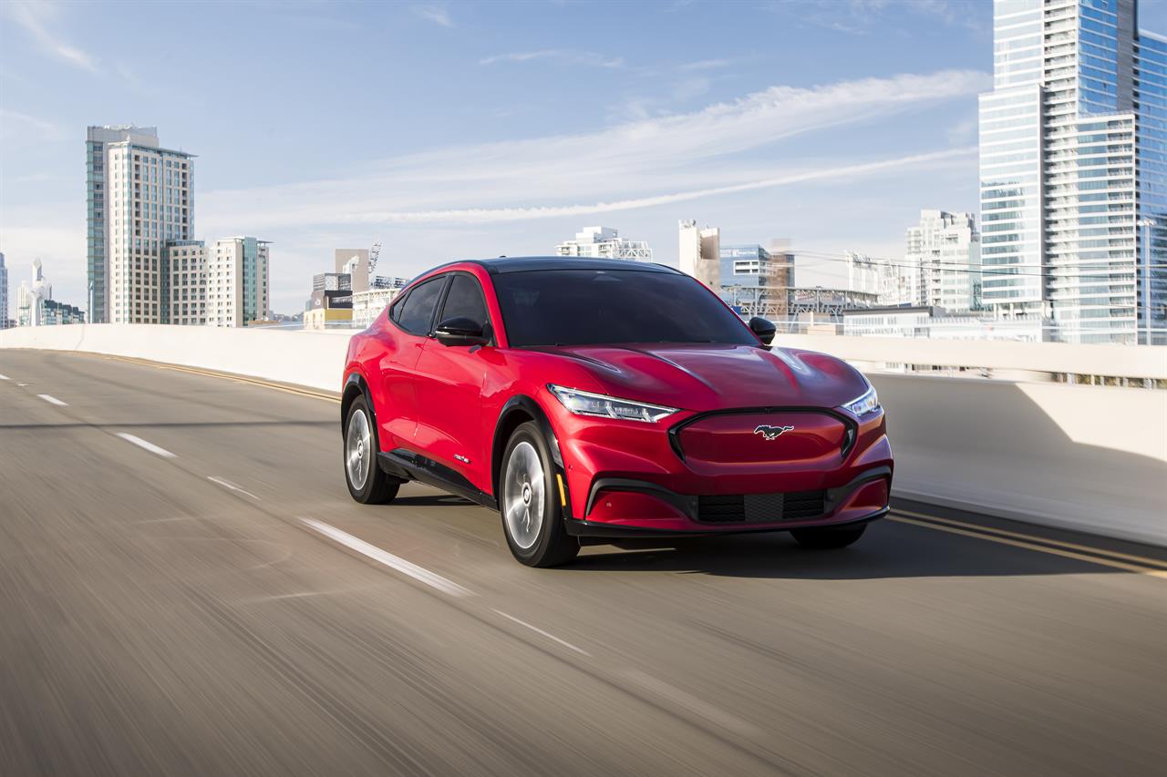 This photo provided by Ford shows the 2021 Ford Mustang Mach-E, an all-new compact electric compact SUV. (James Lipman /Ford Motor Co. via AP)