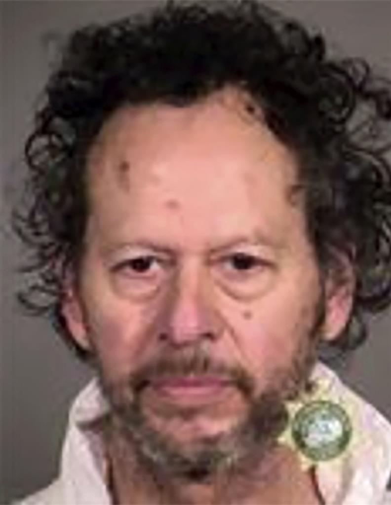 This Tuesday, Jan. 26, 2021 booking photo provided by the Portland Police shows Paul Rivas. Investigators have found no evidence that terrorism, politics or any bias motivated the rampage of the 64-year-old Oregon man who witnesses said repeatedly drove into people along streets and sidewalks in Portland, killing a 77-year-old woman and injuring nine other people, police said. (Portland Police via AP)