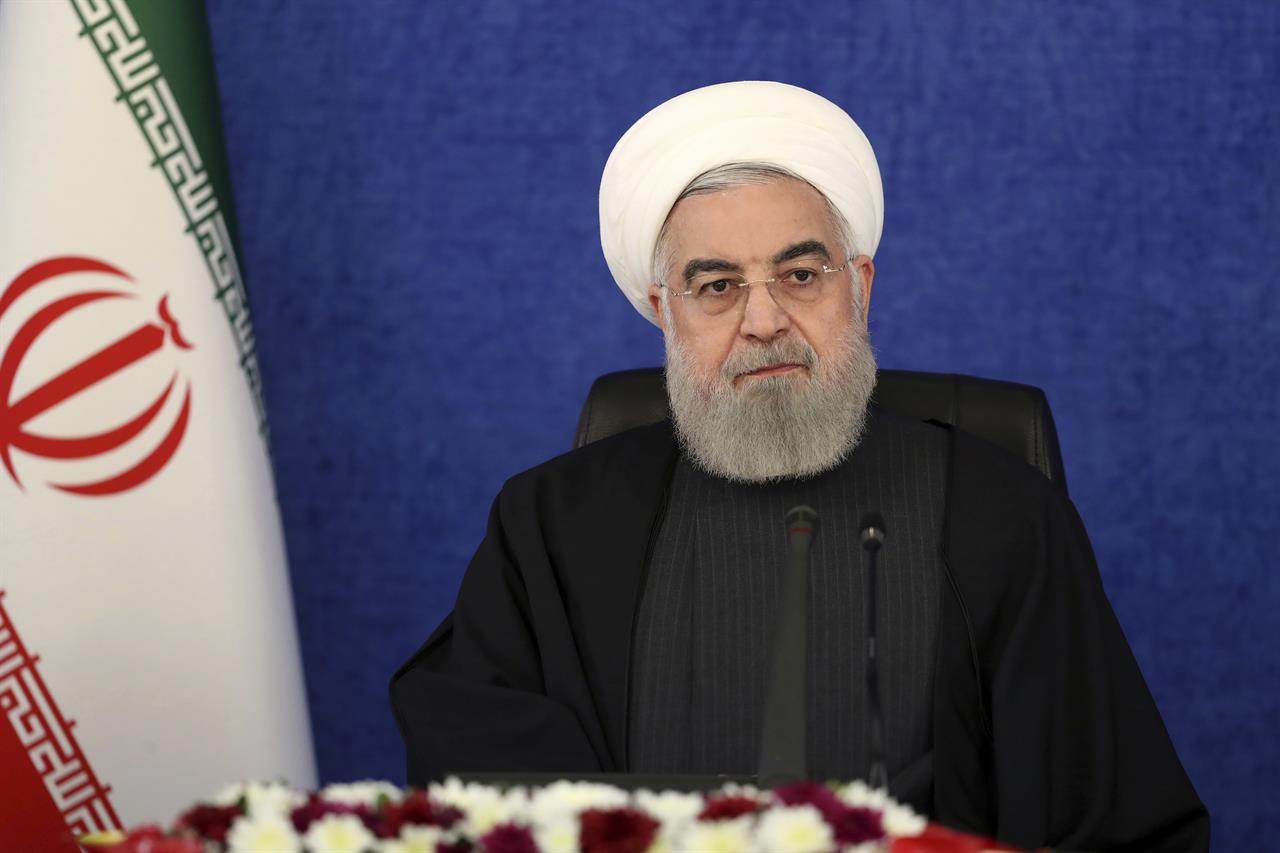 FILE - In this Jan. 7, 2021, file photo released by the official website of the office of the Iranian Presidency, President Hassan Rouhani attends a meeting in Tehran, Iran. Rouhani on Wednesday, Jan. 27, criticized the country's hard-liner dominated judiciary over last week's prosecution of the country's telecommunications minister. (Iranian Presidency Office via AP, File)