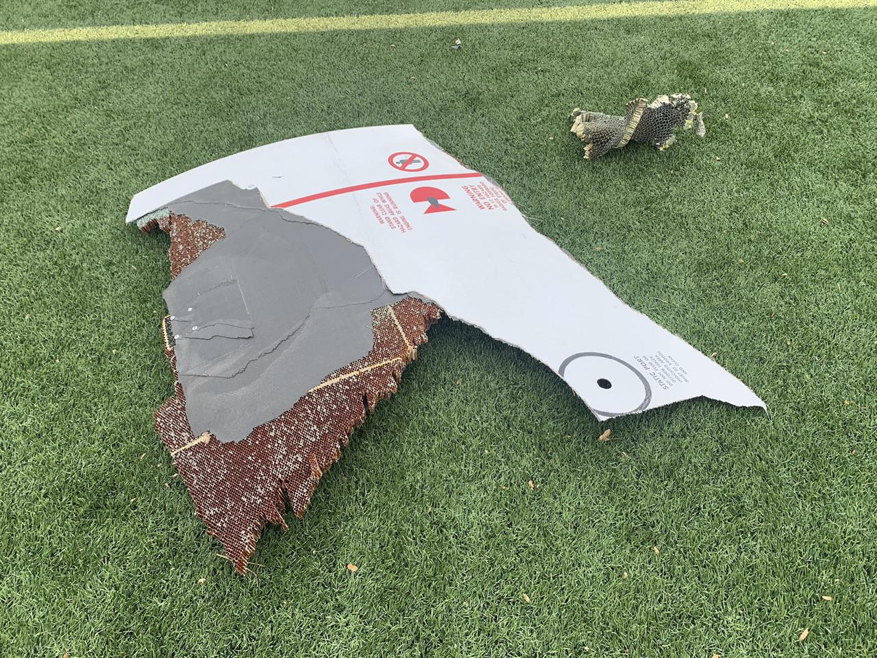 In this photo provided by the Broomfield Police Department on Twitter, debris is scattered across turf field at Commons Park, Saturday, Feb. 20, 2021, in Broomfield, Colo. The police ask that the area be avoided if possible. A commercial airliner dropped debris in Colorado neighborhoods during an emergency landing Saturday.
The Broomfield Police Department said on Twitter that the plane landed safely at Denver International Airport and that no injuries had been reported from the incident. (Broomfield Police Department via AP)