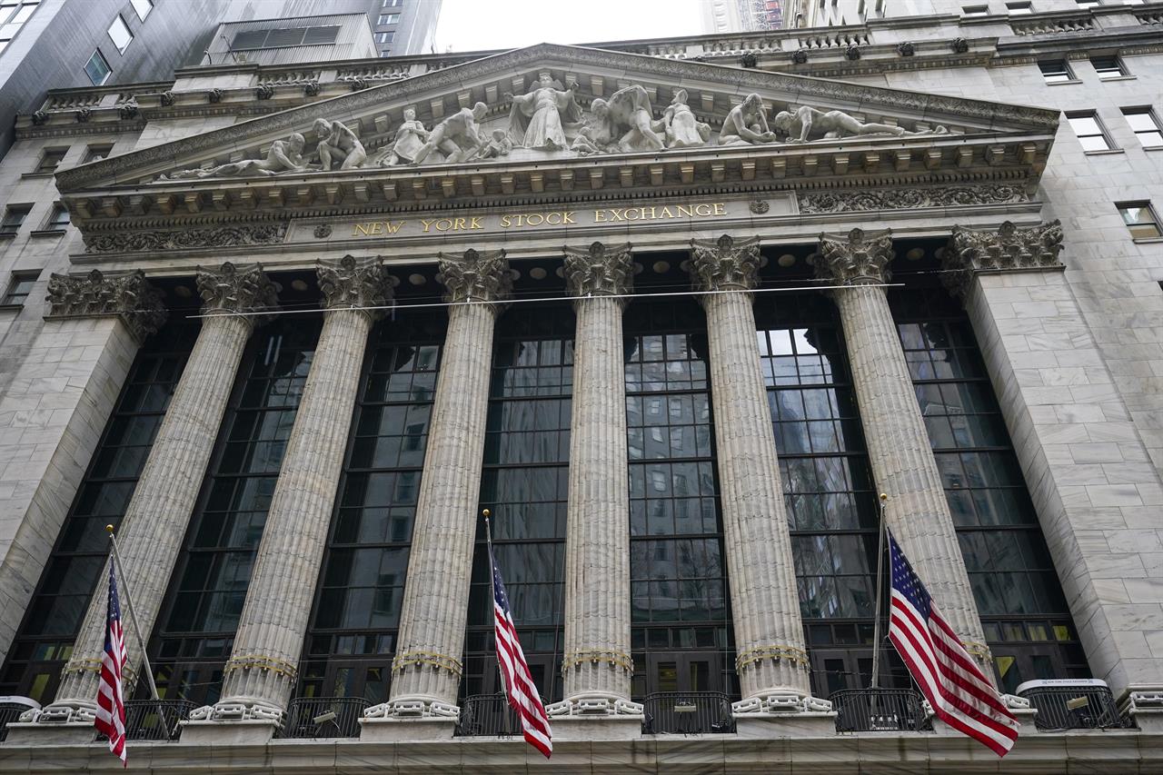 FILE - In this Tuesday, Feb. 16, 2021, American flags hang outside of the New York Stock Exchange in New York. Stocks are opening broadly lower on Wall Street, getting the week off to a sluggish start and continuing a losing streak. The S&P 500 gave up 0.6% in the early going Monday, Feb. 22 and other major indexes were also lower.
(AP Photo/Frank Franklin II, File)