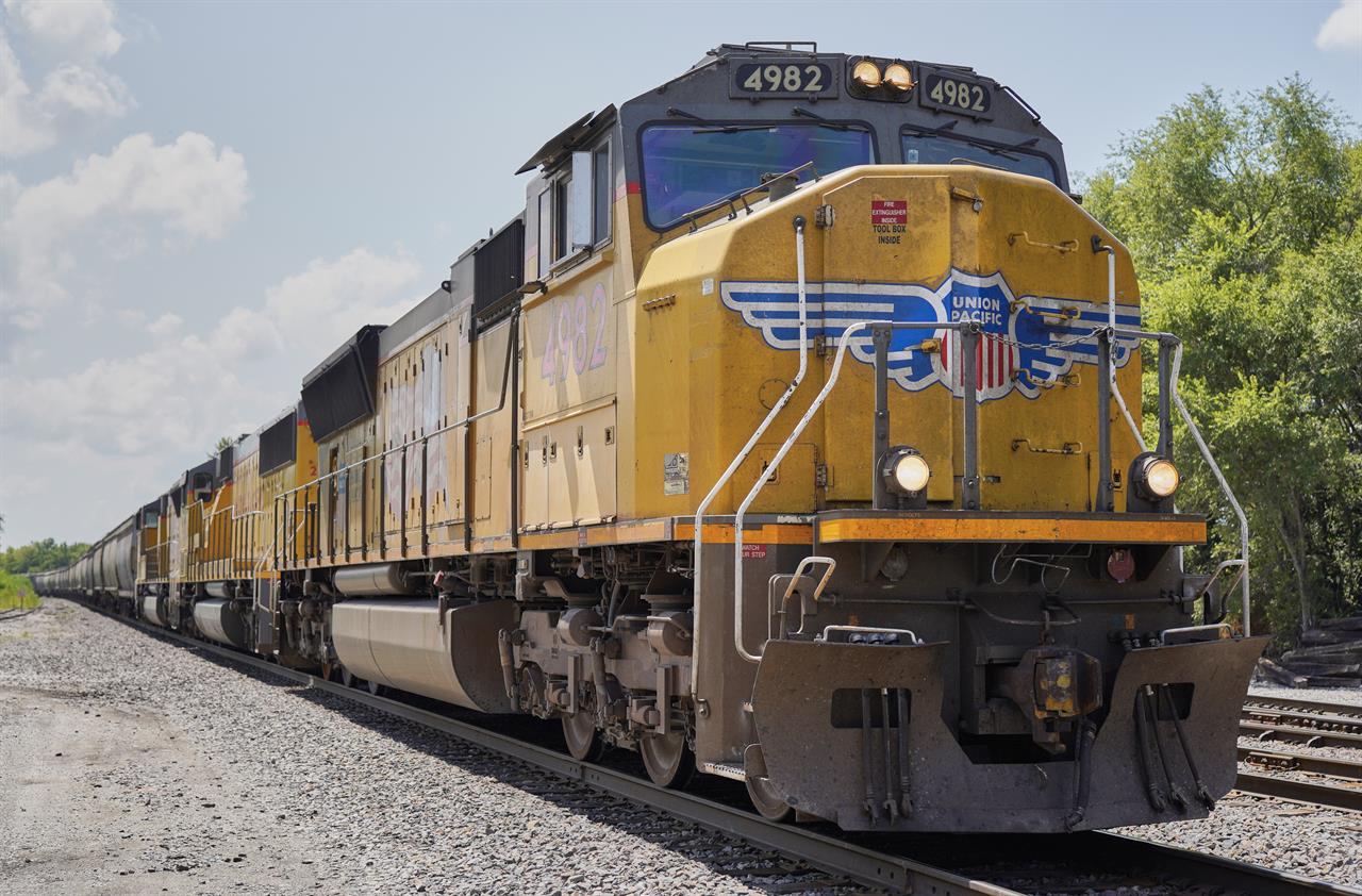 FILE- In this July 31, 2018, file photo a Union Pacific train travels through Union, Neb. A federal judge has ruled that the nation's four largest railroads can't exclude details of their conversations from lawsuits challenging billions of dollars of charges the railroads imposed in the past. The ruling on Friday, Feb. 19, 2021, undercuts one of the defenses Union Pacific, BNSF, CSX and Norfolk Southern had offered in dozens of lawsuits major companies filed last year questioning the way railroads set rates. (AP Photo/Nati Harnik, File)