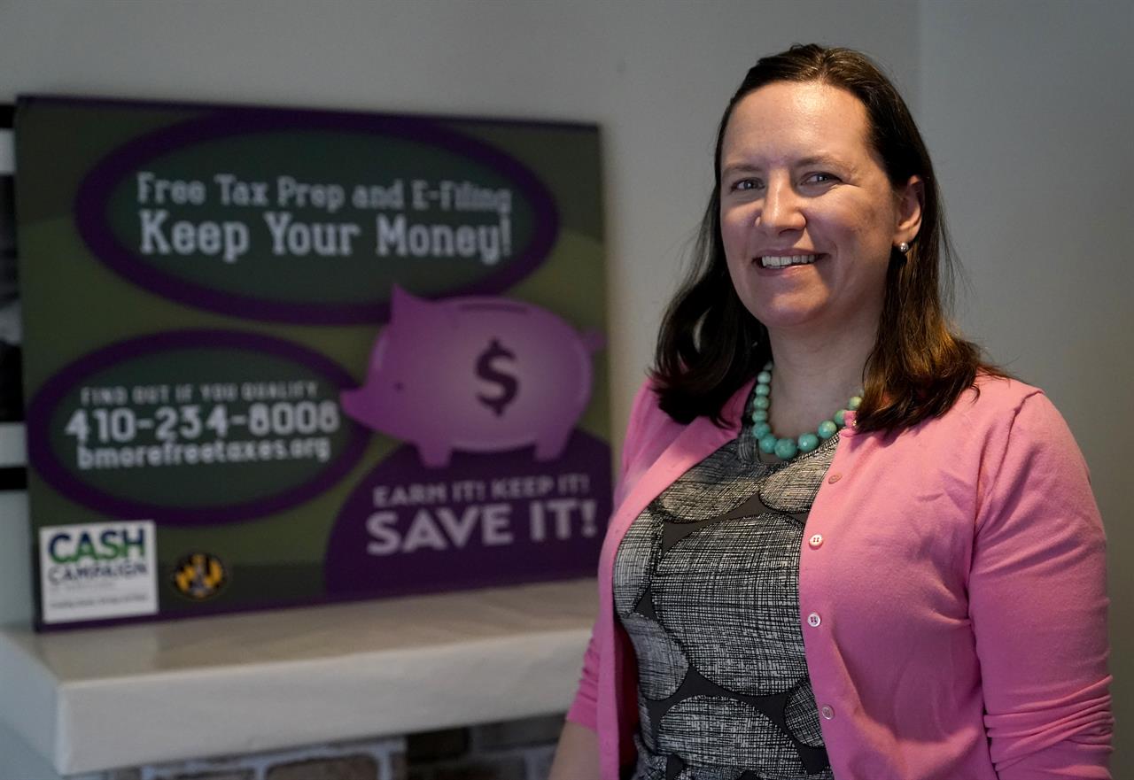 Robin McKinney, CEO of CASH Campaign of Maryland, poses for The Associated Press, Tuesday, Feb. 23, 2021, in Columbia, Md. Not waiting for more federal help, states have been approving their own coronavirus aid packages and spending hundreds of millions of dollars to prop up their economy and bail out struggling residents. "Absent of a federal response, the states are having to step up," McKinney said. (AP Photo/Julio Cortez)