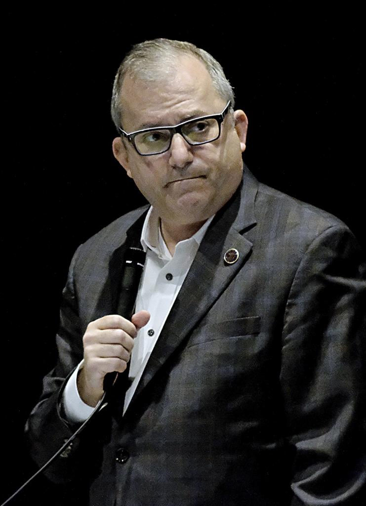 Sen. Adam Ebbin, D-Alexandria, listens to a question as he speaks for passage of HB2312. the bill dealing with legalization of marijuana during the floor session of the Virginia Senate, which is meeting inside the Science Museum of Virginia in Richmond, Va., Saturday, Feb. 27, 2021. (Bob Brown/Richmond Times-Dispatch via AP)