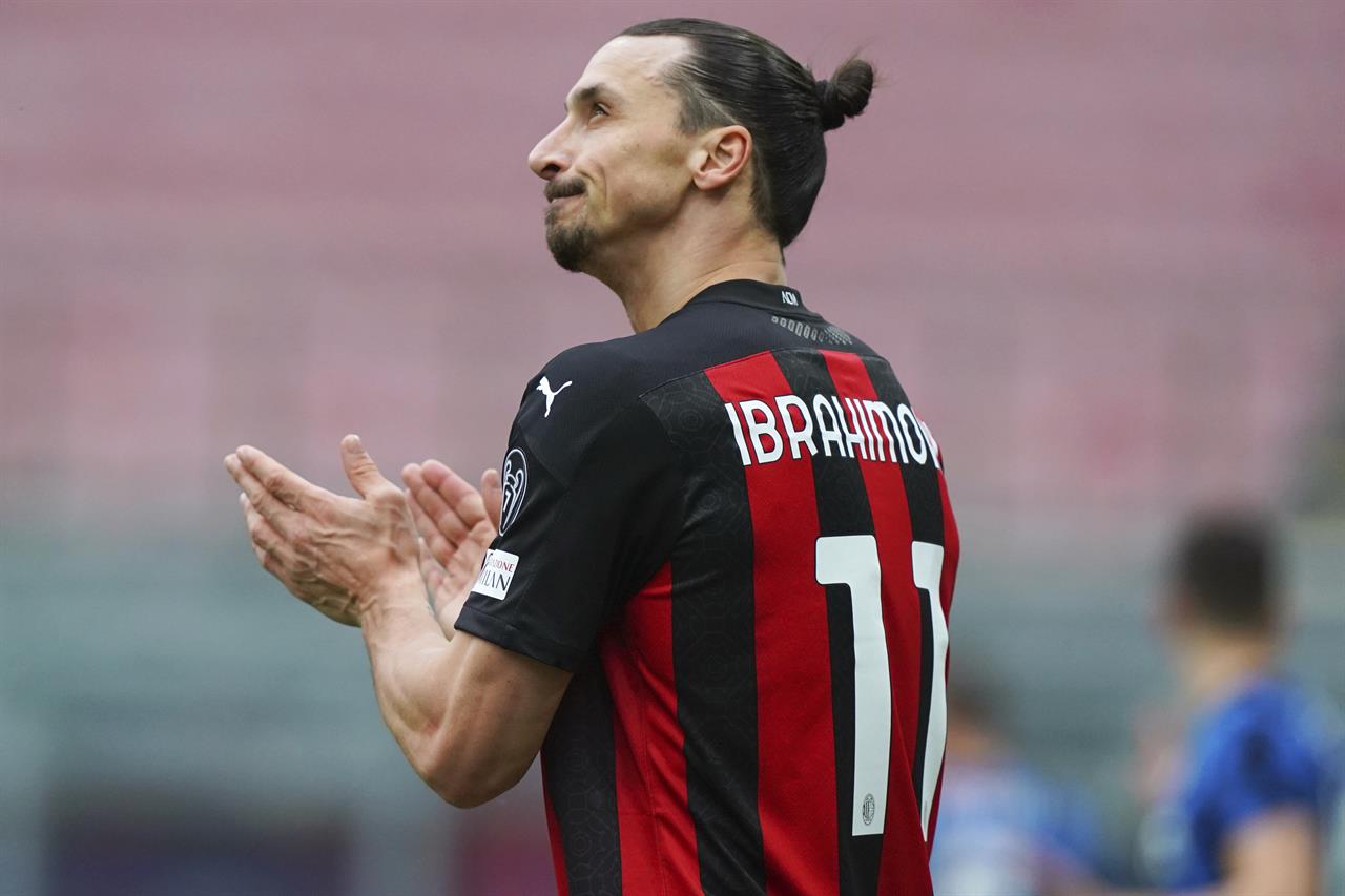 AC Milan's Zlatan Ibrahimovic looks up during the Serie A soccer match between AC Milan and Inter Milan, at the San Siro Stadium in Milan, Italy, Sunday, Feb. 21, 2021. (Spada/LaPresse via AP)