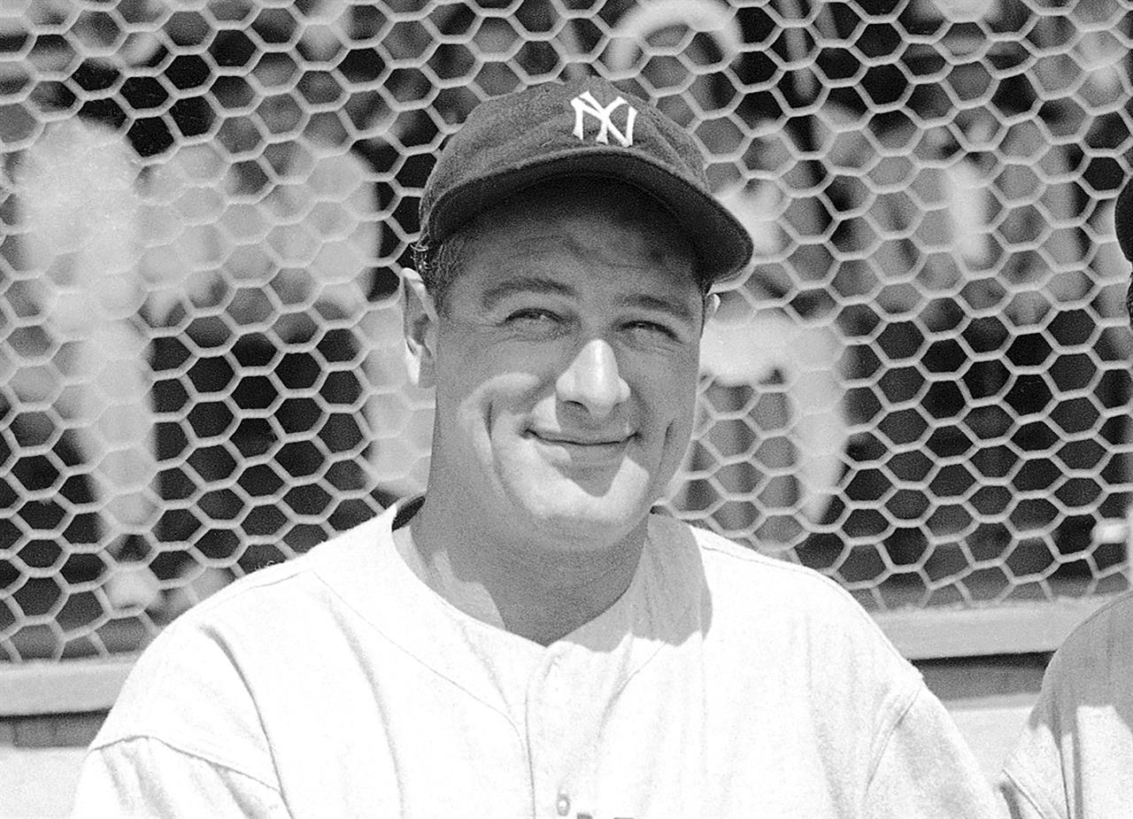 FILE - New York Yankees' Lou Gehrig poses at a spring training game in St. Petersburg, Fla., in this March 16, 1935, file photo. Major League Baseball will hold its first Lou Gehrig Day on June 2, 2021, adding Gehrig to Jackie Robinson and Roberto Clemente on the short list of players honored throughout the big leagues. (AP Photo/Tom Sande, File)