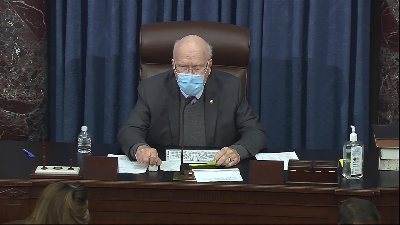 In this image from video, Sen. Patrick Leahy, D-Vt., the president pro tempore of the Senate, presides during debate on the Senate COVID-19 relief bill in the Senate at the U.S. Capitol in Washington, Saturday, March 6, 2021. (Senate Television via AP)