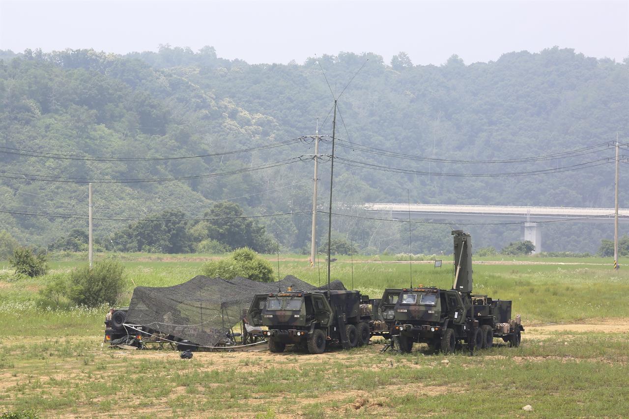FILE - U.S. Army mobile equipment sits in a field in Yeoncheon, South Korea, near the border with North Korea, Wednesday, June 17, 2020. The State Department says the U.S. and South Korea have reached an agreement in principle on a new arrangement for sharing the cost of the American troop presence. Details were not released, but the State Department's Bureau of Political-Military Affairs said Sunday, March 7, 2021 that the deal includes a negotiated increase in Seoul's share of the cost for the U.S. troop presence. (AP Photo/Ahn Young-joon)