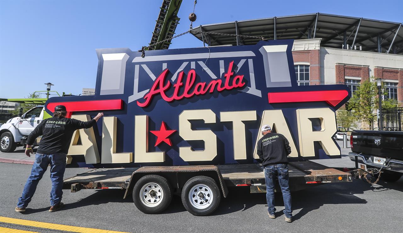 Workers load an All-Star sign onto a trailer after it was removed from Truist Park in Atlanta, Tuesday, April 6, 2021. Major League Baseball plans to relocate the All-Star Game to Coors Field in Denver after pulling this year's Midsummer Classic from Atlanta over objections to sweeping changes to Georgia's voting laws, according to a person familiar with the decision.
The person spoke to The Associated Press on condition of anonymity Monday night, April 5, 2021, because MLB hadn’t announced the move yet. (John Spink/Atlanta Journal-Constitution via AP)