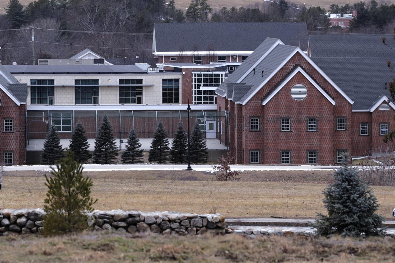 FILE - In this Jan. 28, 2020, file photo is the Sununu Youth Services Center in Manchester, N.H. New Hampshire's attorney general's office said six men were arrested Wednesday, April 7, 2021, in connection with sexual abuse allegations at the state-run youth detention center. (AP Photo/Charles Krupa, File)